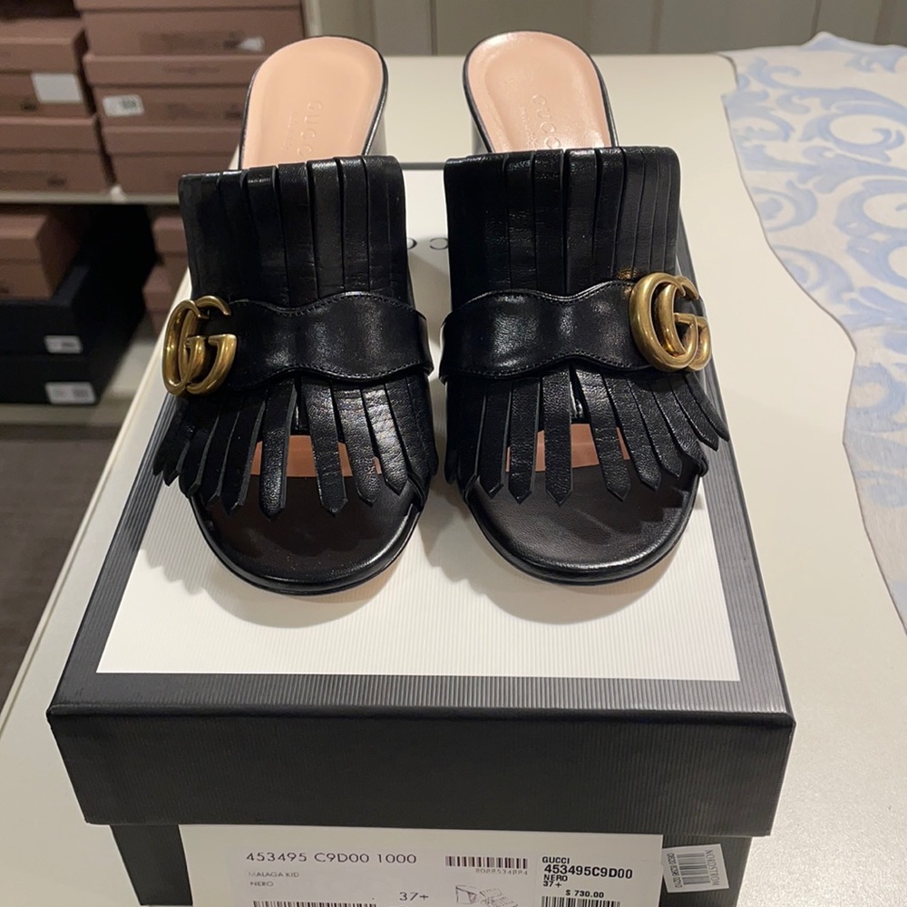 Gucci fringed open toe slides